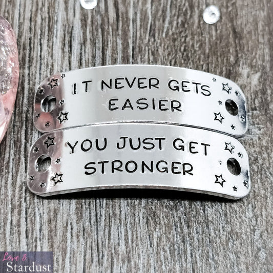 IT NEVER GETS EASIER YOU JUST GET STRONGER Trainer Tags