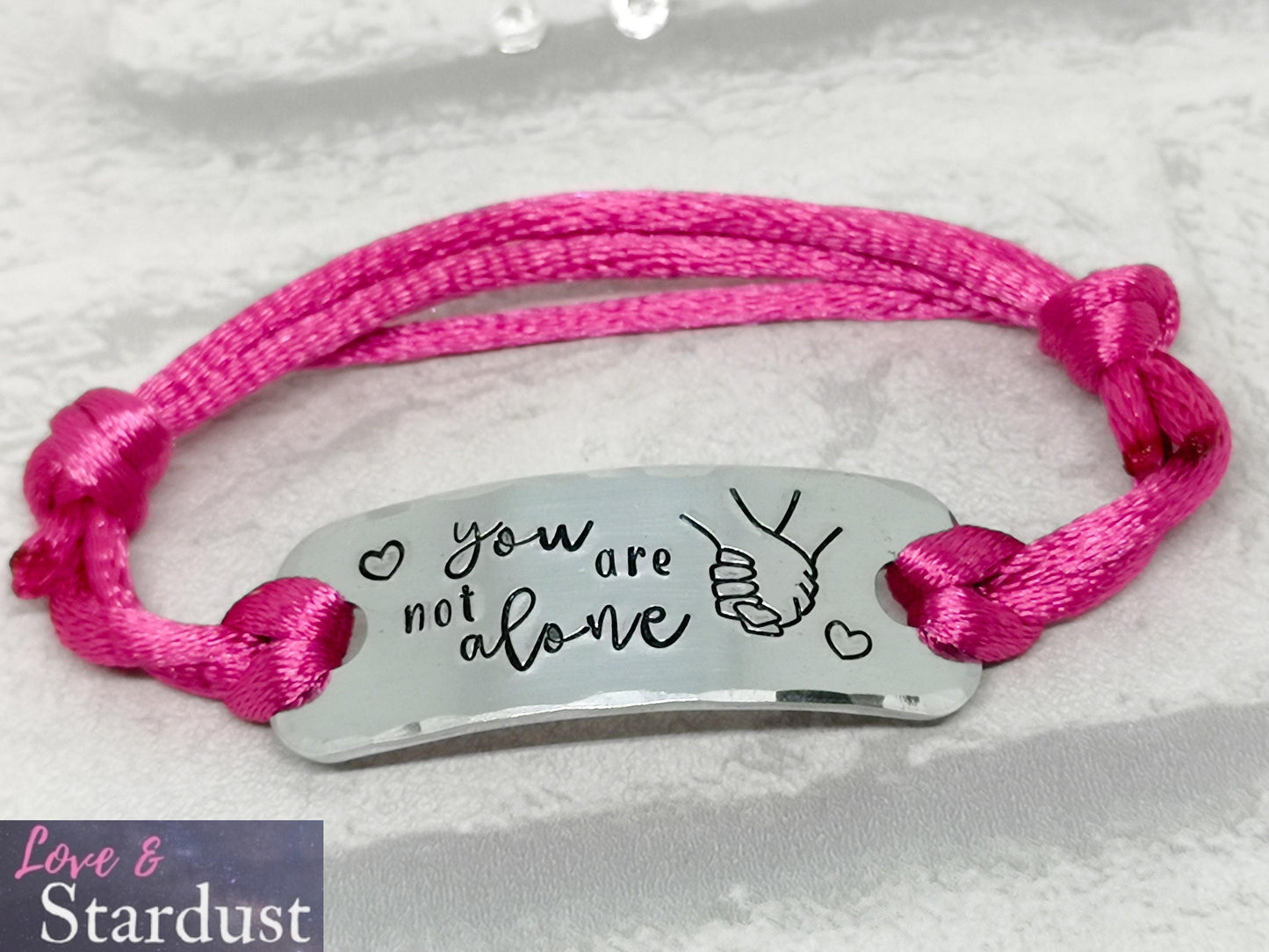 YOU ARE NOT ALONE Adjustable Bracelet