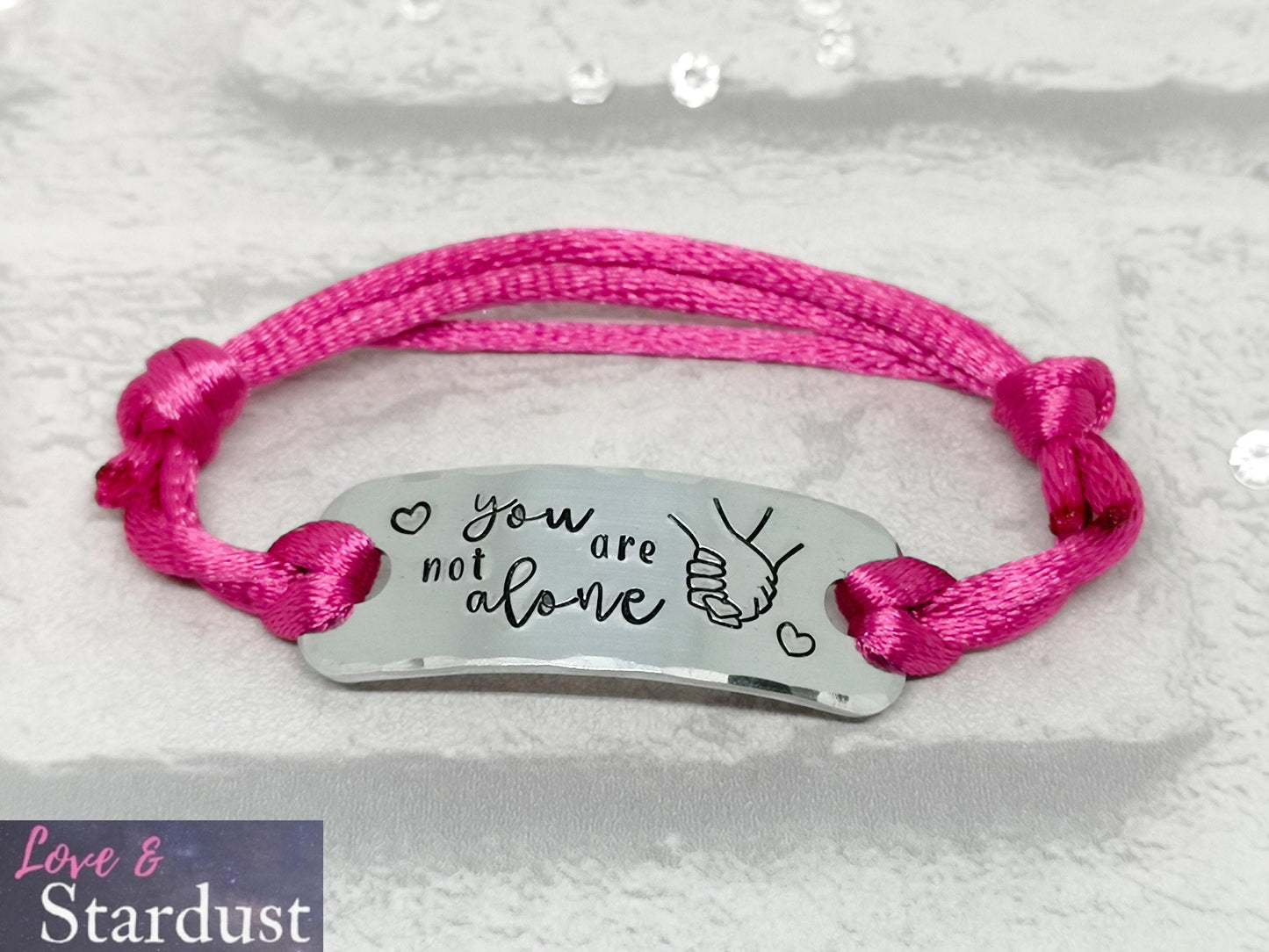 YOU ARE NOT ALONE Adjustable Bracelet