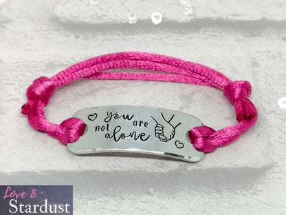 YOU ARE NOT ALONE Adjustable Bracelet