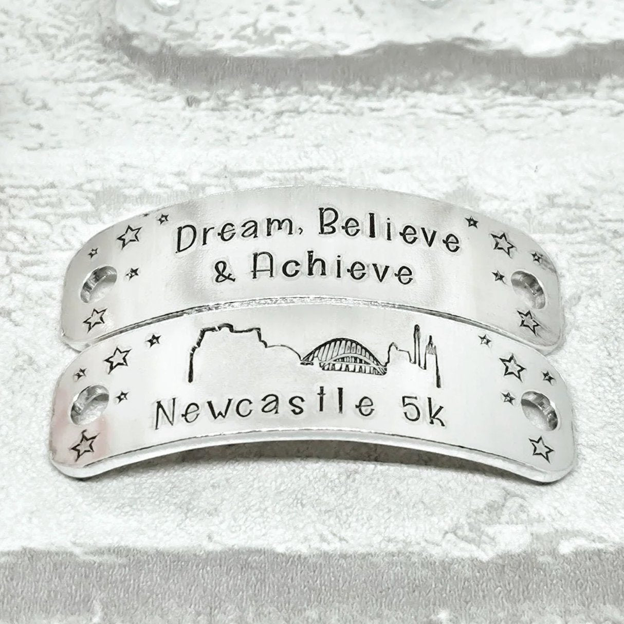 NEWCASTLE Skyline Trainer Tags