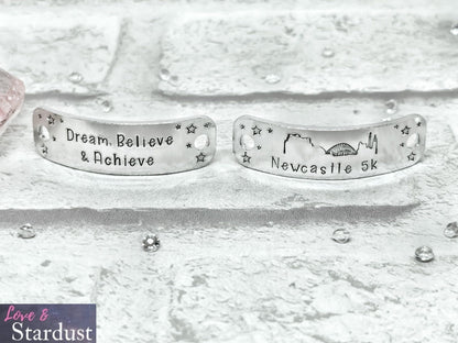 NEWCASTLE Skyline Trainer Tags