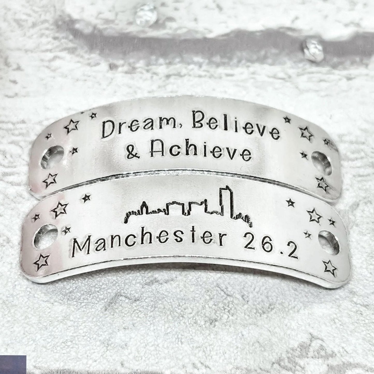 MANCHESTER Skyline Trainer Tags